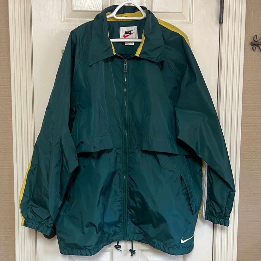 Nike XL dark green and yellow jacket. Great condition! Mesh lining